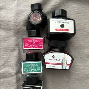 Collection of fountain pen ink including: Herbin, Diplomat, colorverse Chi Town